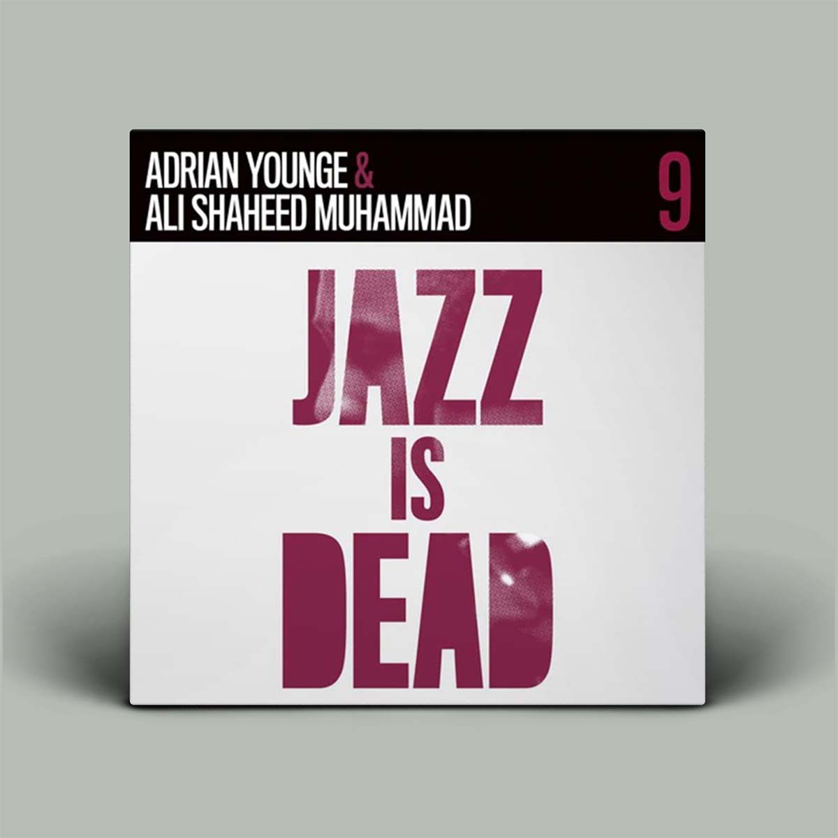 Album cover with 'Jazz is Dead' text and artist names on a gray background