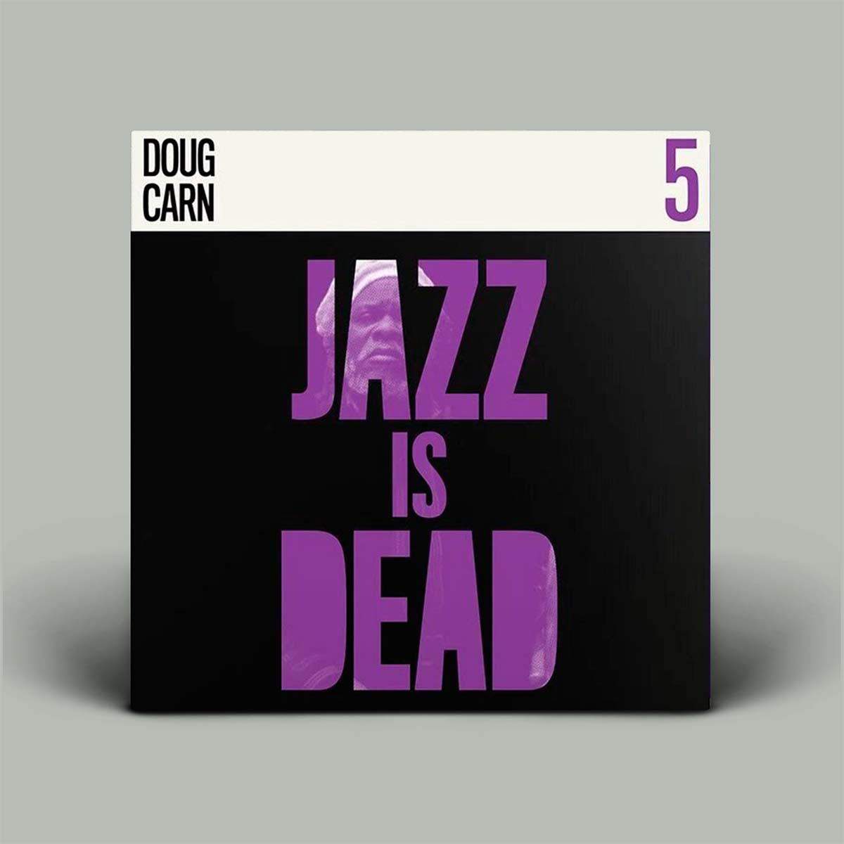 Album cover with 'Doug Carn' and 'Jazz is Dead' text on a black background