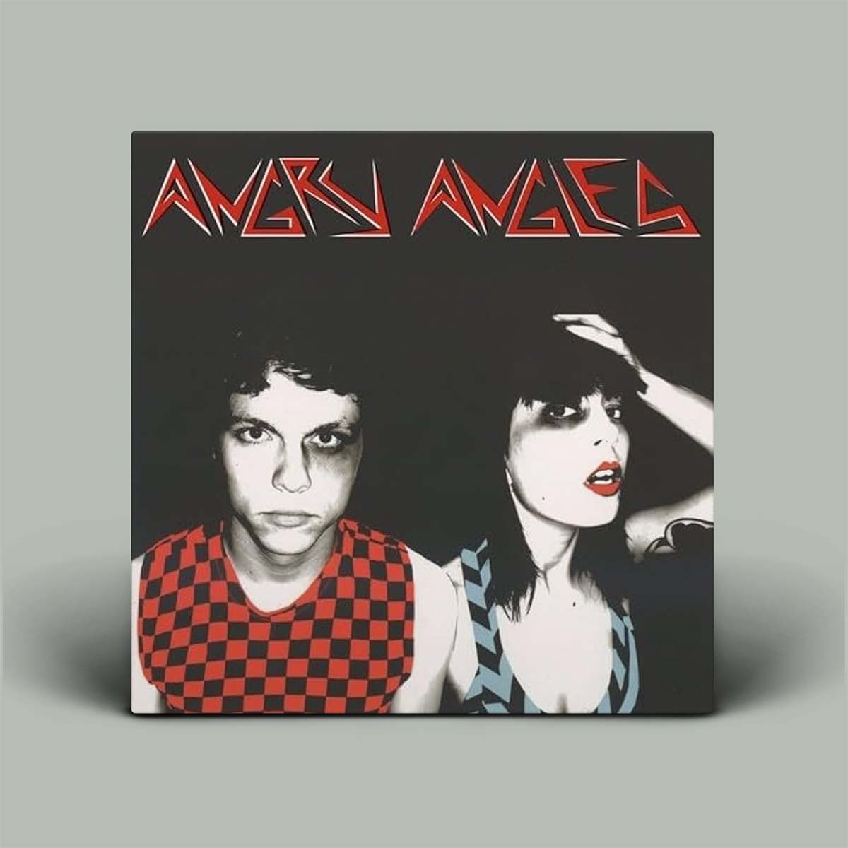 Album cover with photo of two people and the words Angry Angles