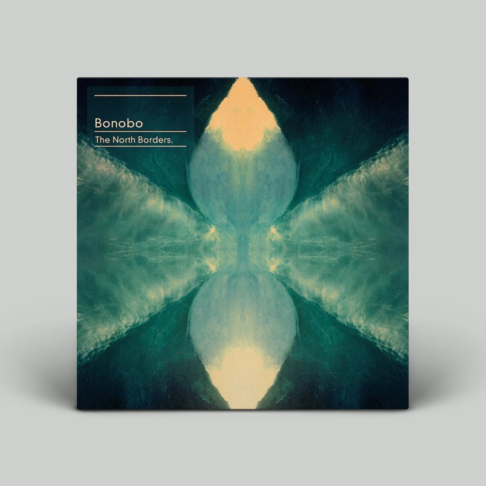 Album cover for 'The North Borders' by Bonobo with a symmetrical design and gradient colors.