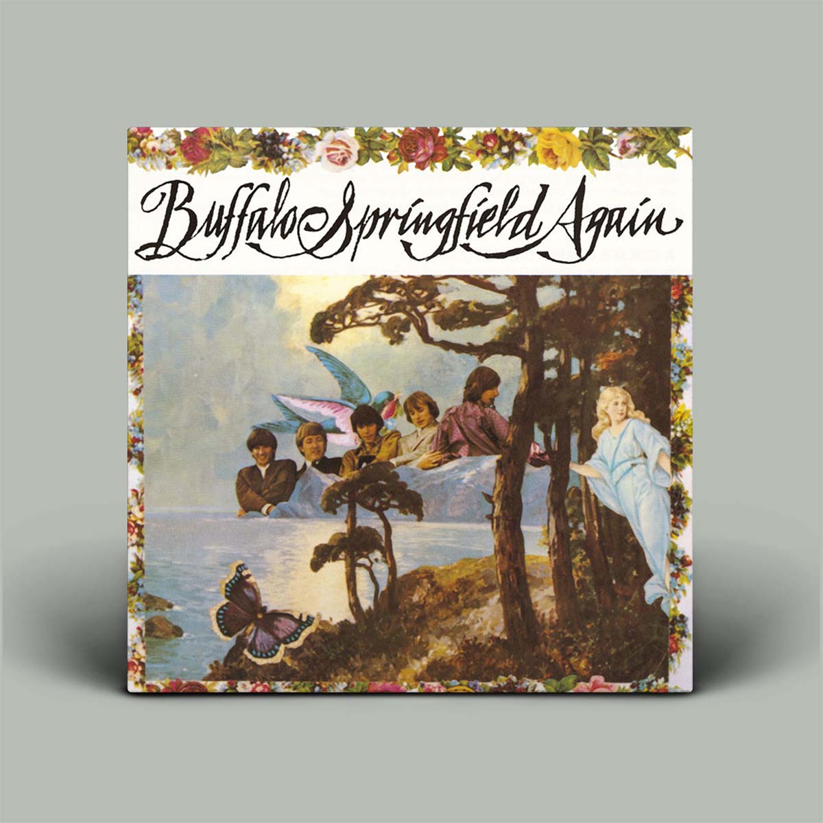 Album cover of 'Buffalo Springfield Again' with a scenic illustration and floral border.