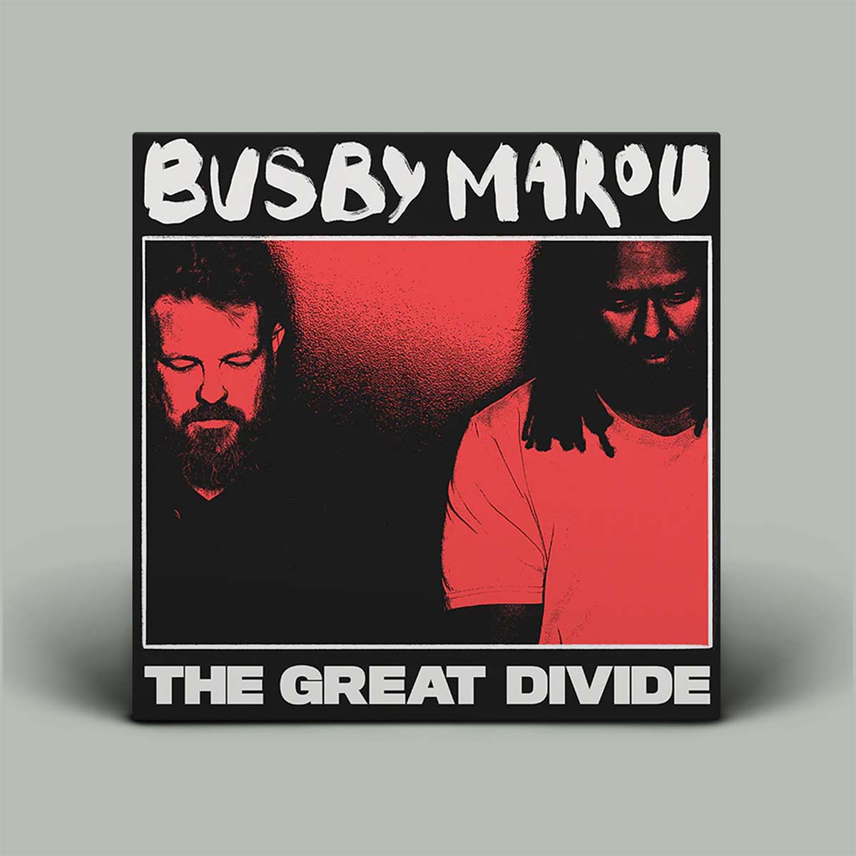 Album cover with red and black photo of two people with the words Busby Marou and The Great Divide in white.