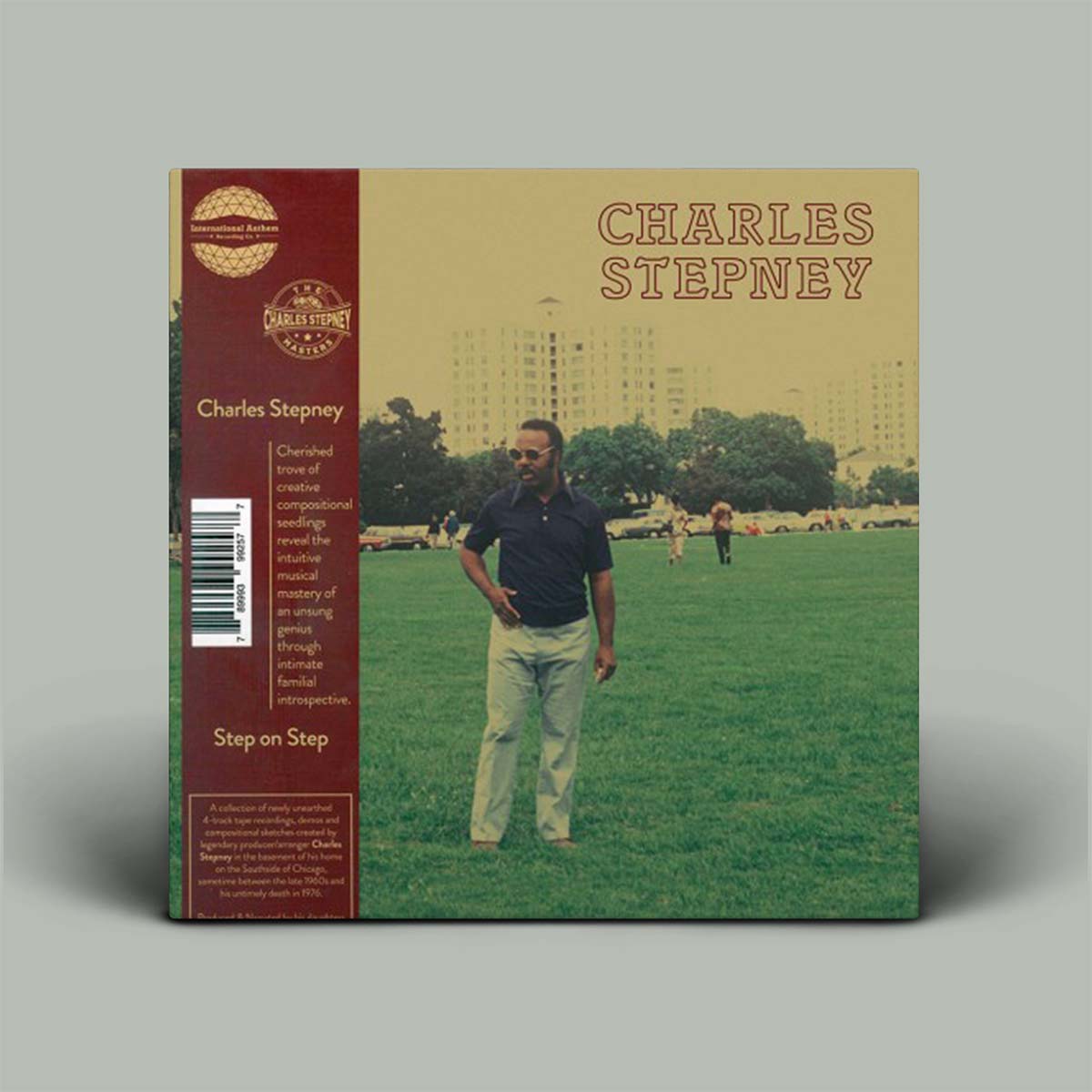 Album cover for Charles Stepney's 'Step on Step' featuring a man walking on grass with trees and buildings in the background.