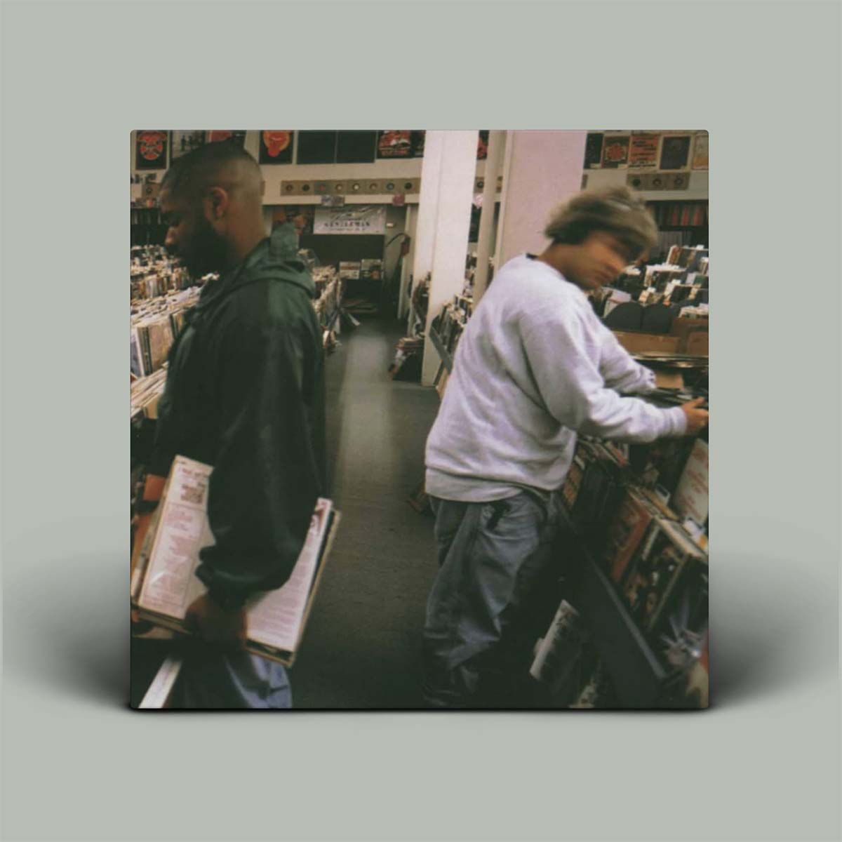 Album cover with two people in a record store