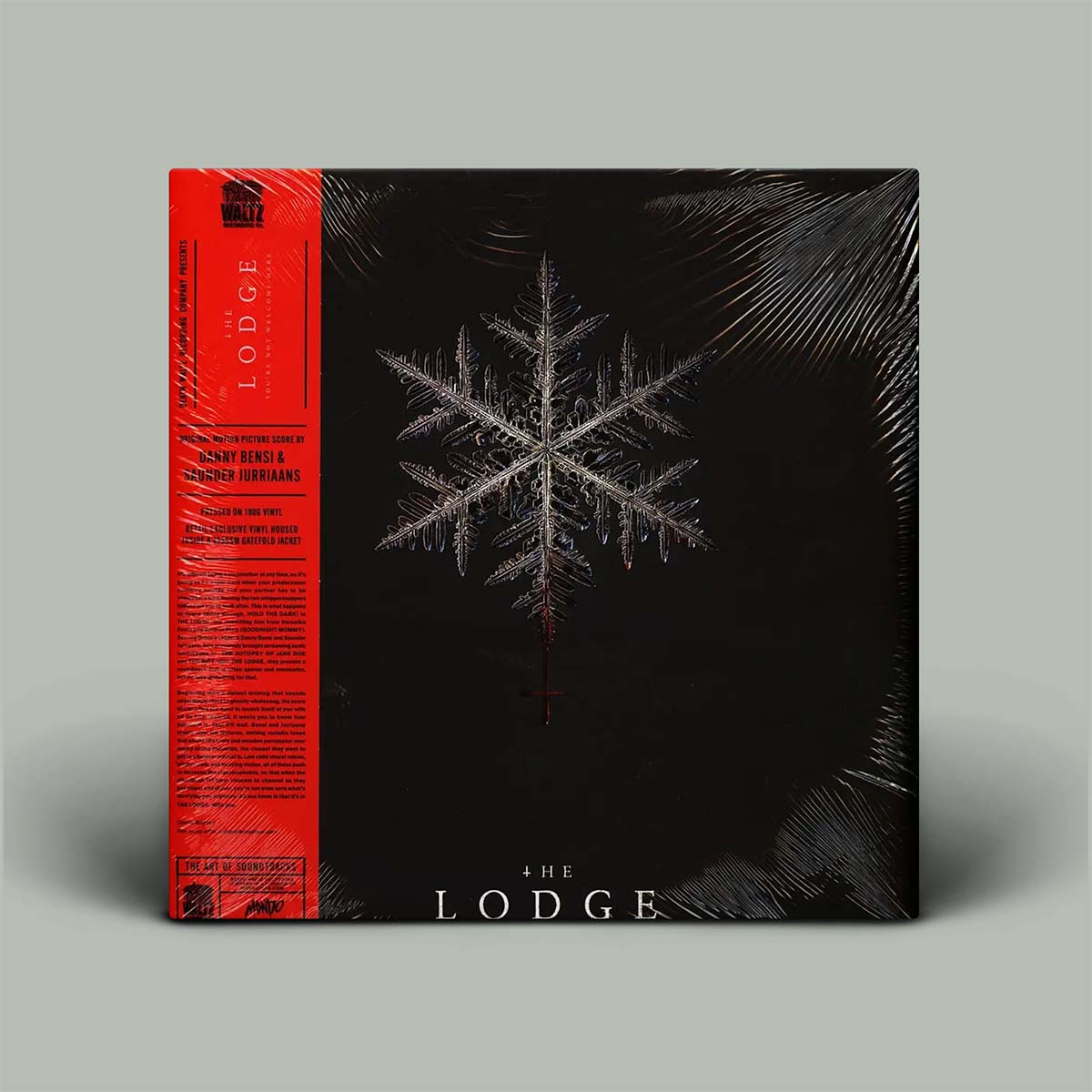 Vinyl record cover for 'The Lodge' with red and black design