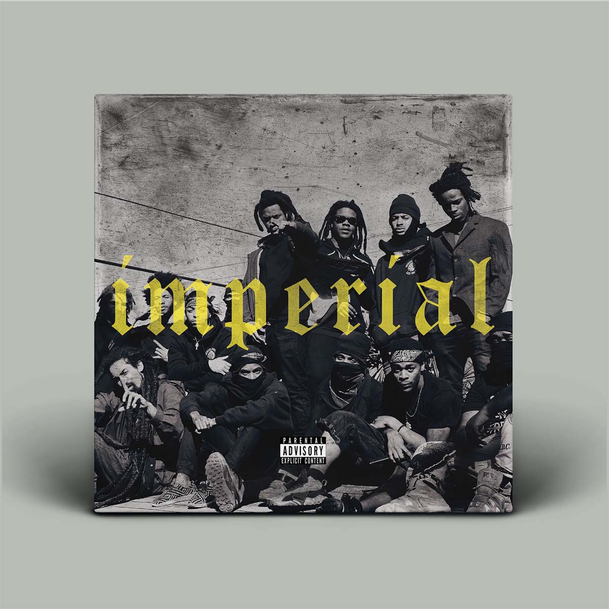Album cover with text 'imperial' and a black and white photo of people on a gray background