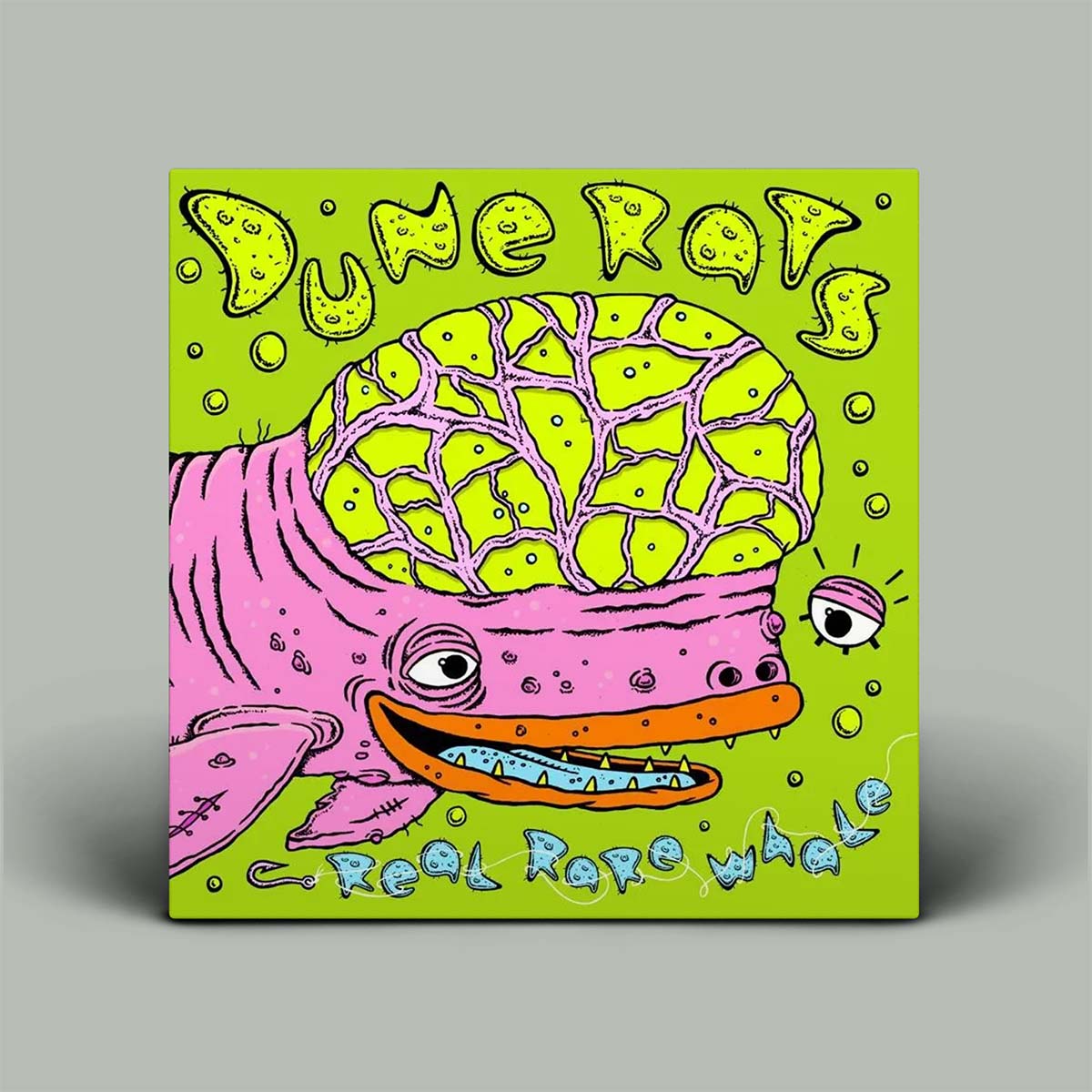 Colorful album cover with a pink creature and green background