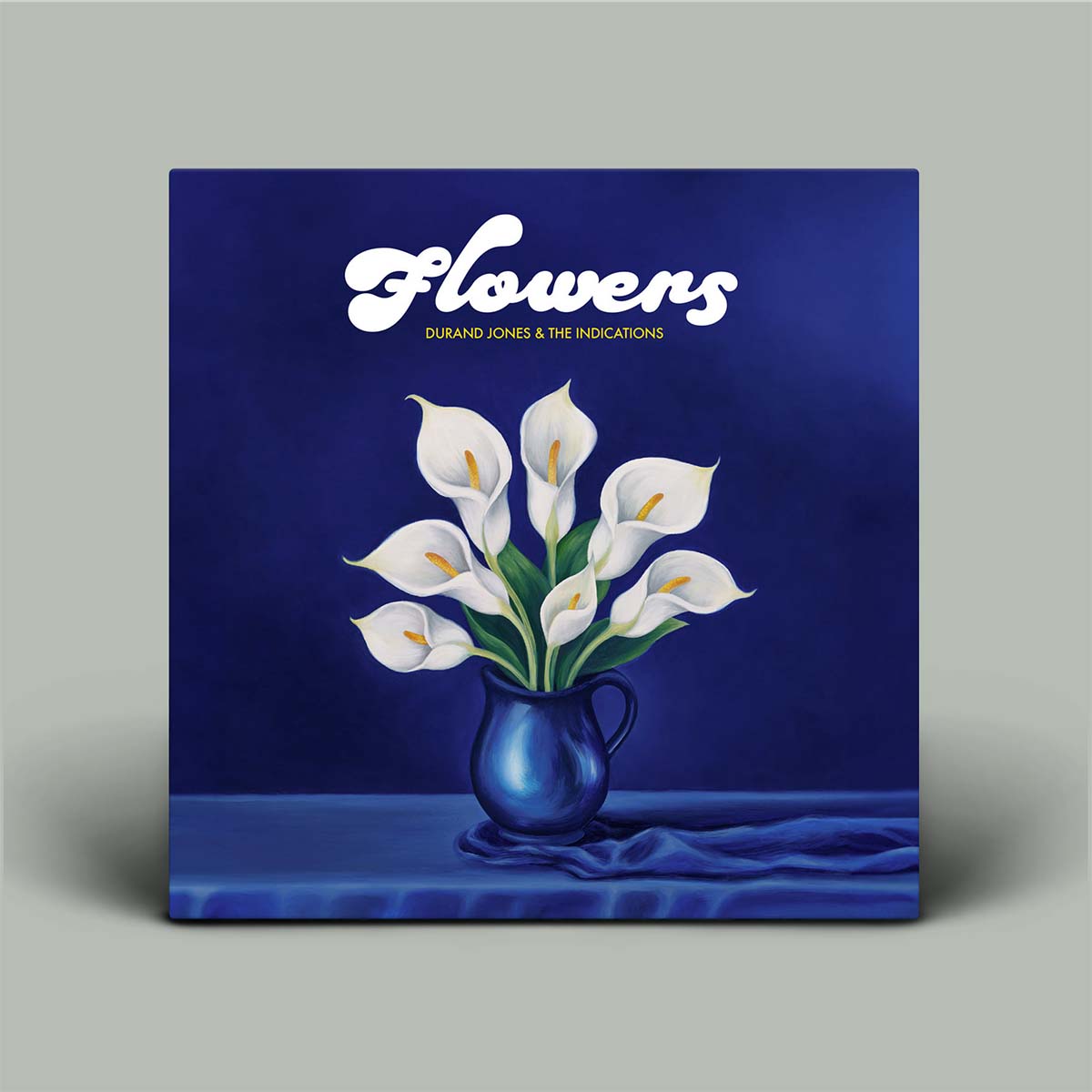 Album cover with white flowers in a blue vase on a dark blue background