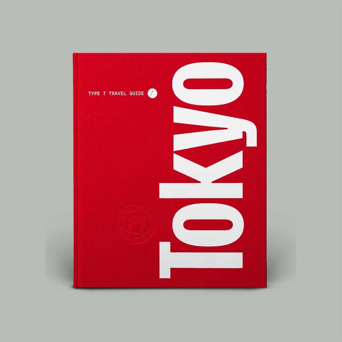 Red book titled 'TOKYO' with white text on a gray background