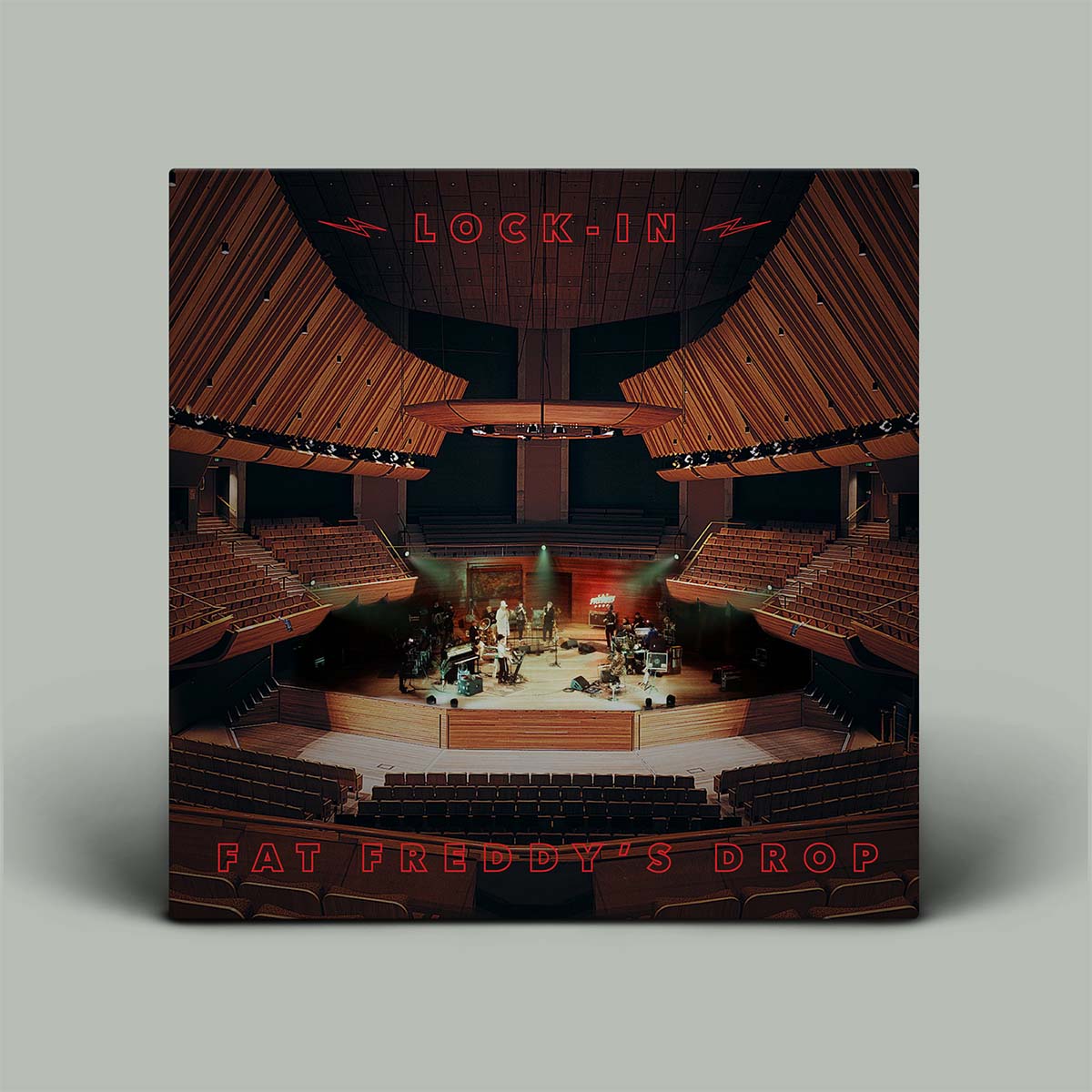 Album cover of 'Lock-In' by Fat Freddy's Drop with a theater interior design.