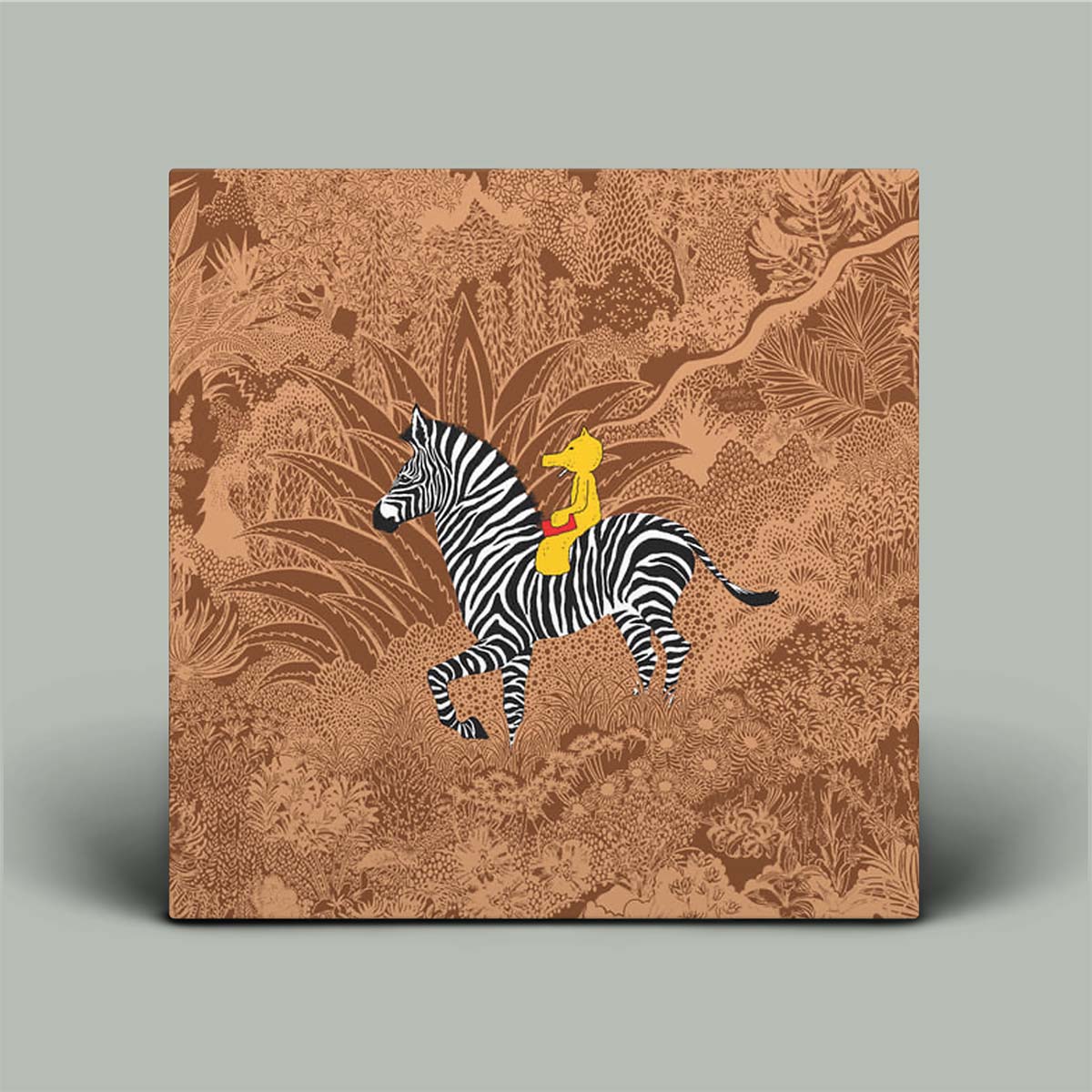 Canvas print with a zebra and person design on a patterned background