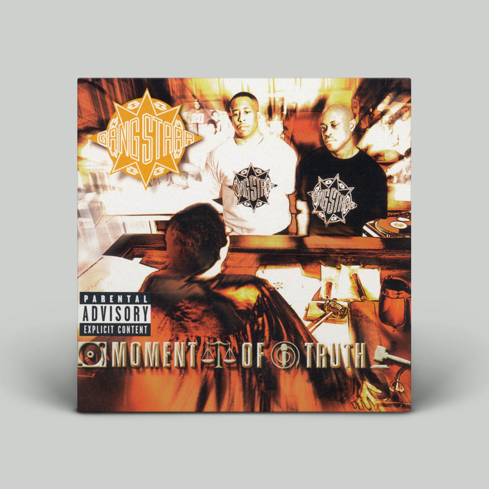 Album cover for 'Moment of Truth' by Go-Go's featuring two individuals and a star logo.