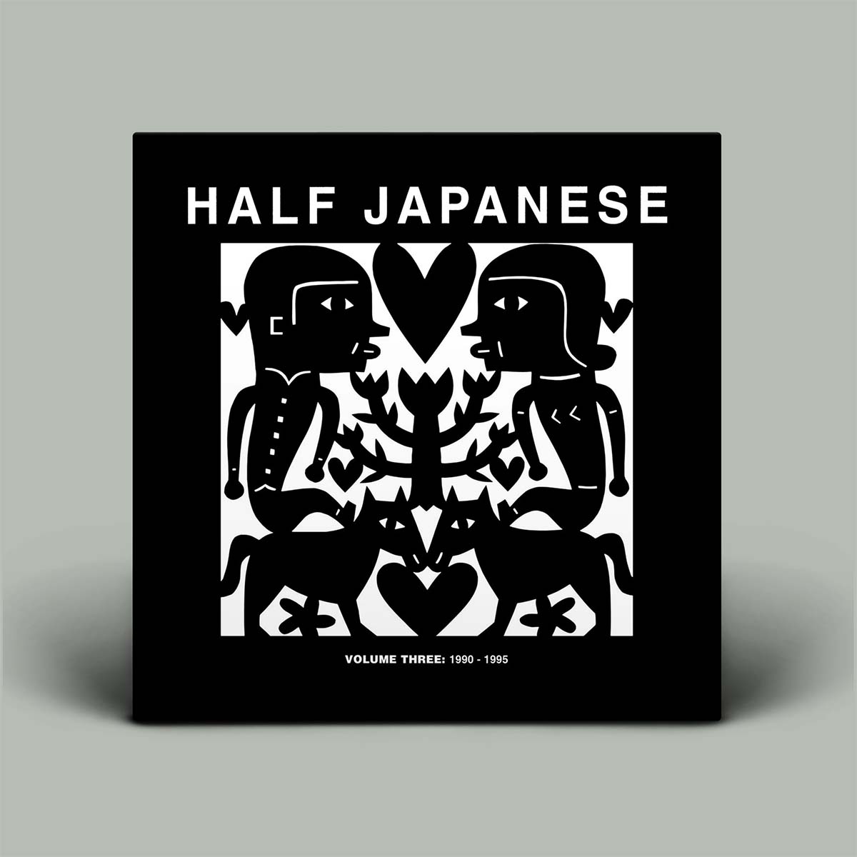 Album cover for 'Half Japanese' with black and white design on a gray background