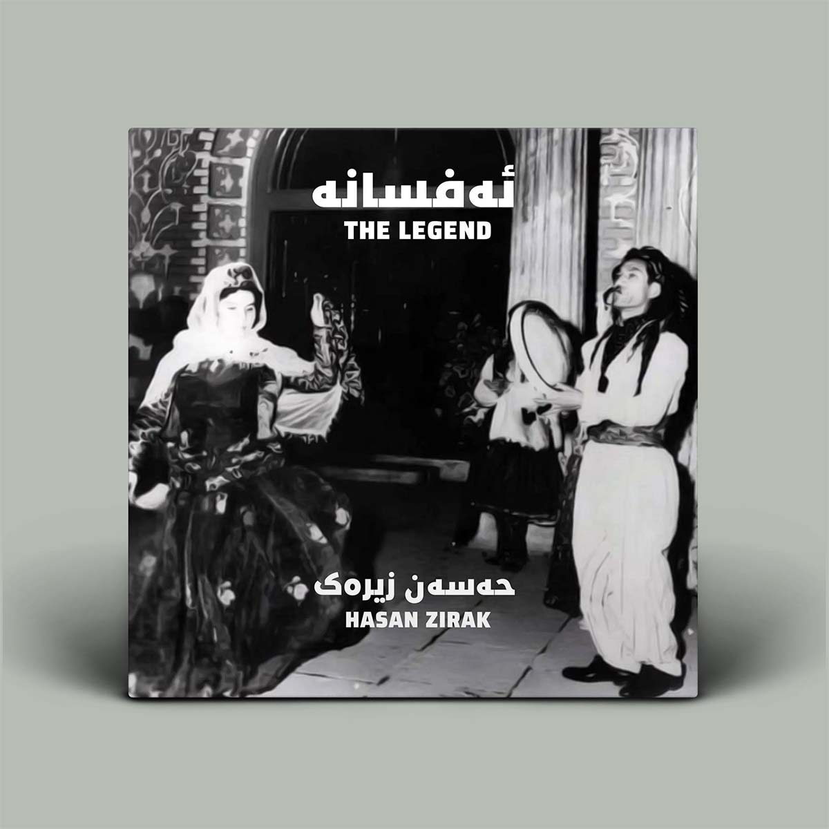 Album cover with black and white photograph of three people, text 'The Legend' and 'Hasan Zirak'.