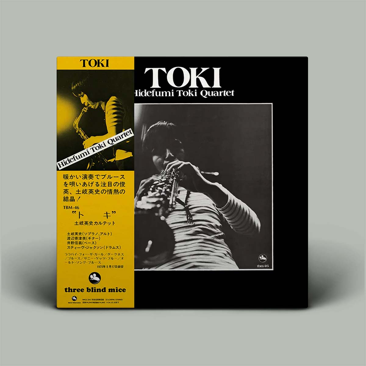 Album cover of 'TOKI' by hidefumi toki quartet with a musician playing a flute.