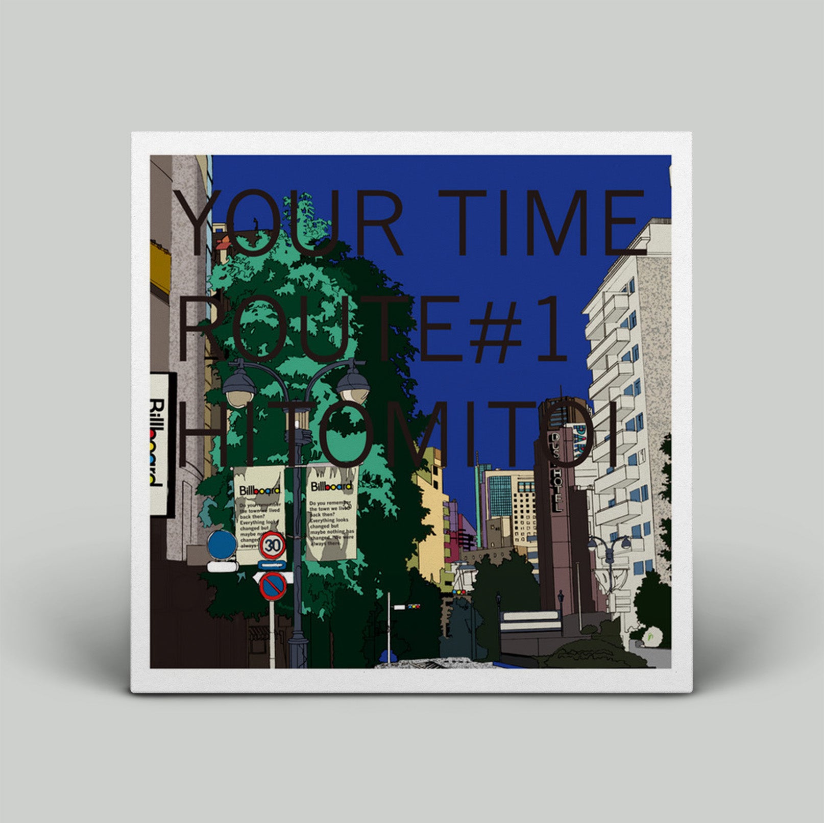 Framed artwork with cityscape and text 'YOUR TIME ROUTE#1 HOMED', on a gray background