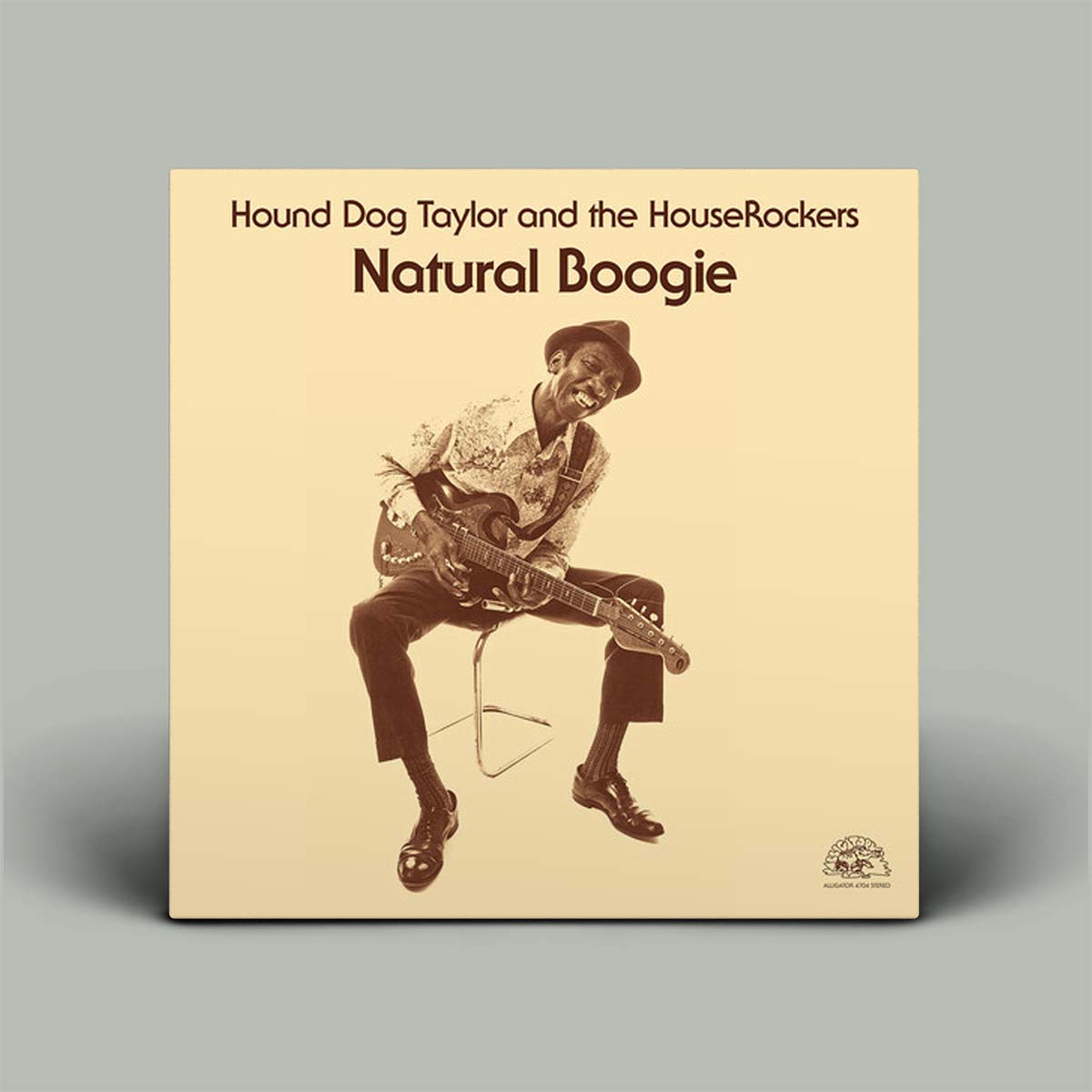 Album cover of 'Natural Boogie' by Hound Dog Taylor and the HouseRockers with a vintage-style illustration of a man playing guitar.