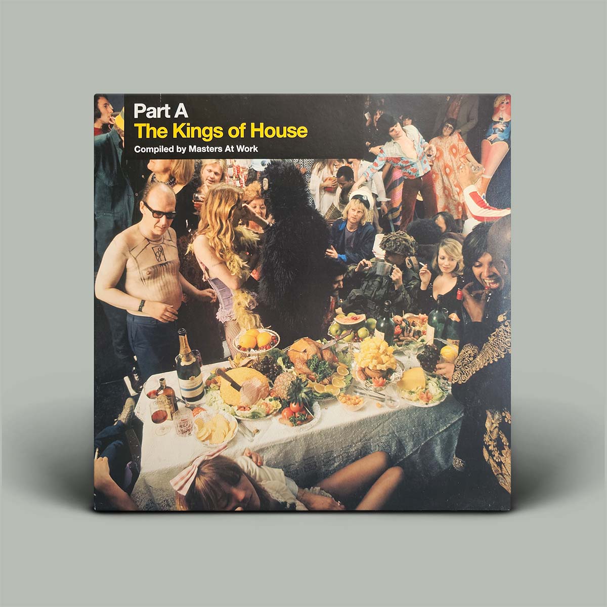 Album cover featuring photograph of many people at a party.