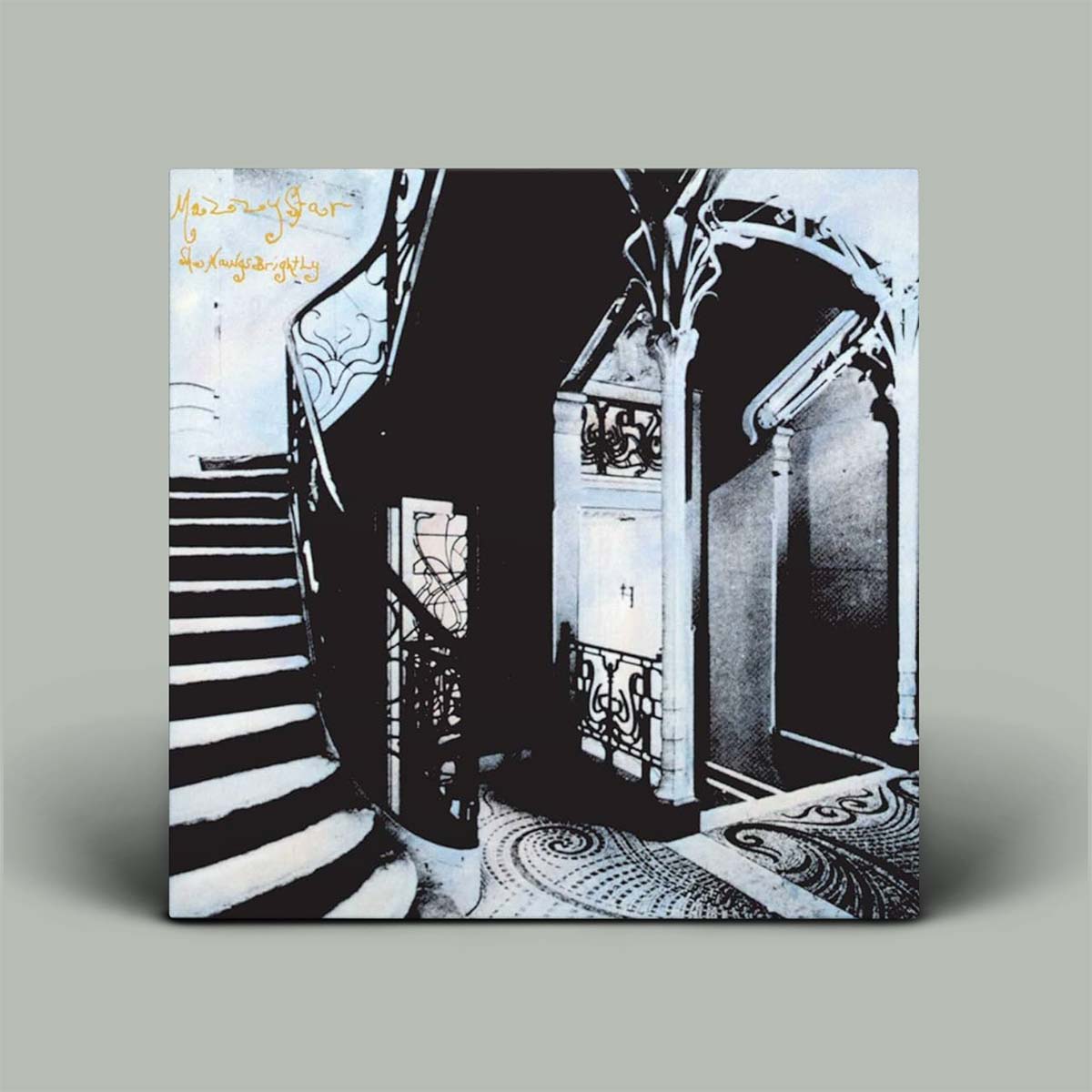 Album cover with black and white design of a staircase and archway.