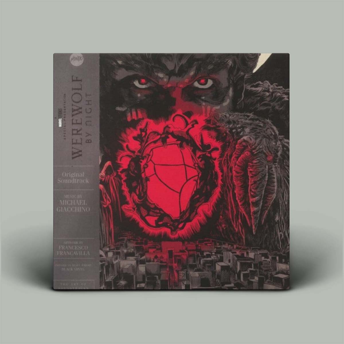 Vinyl record cover for 'Werewolf by Night' with wolf design and red accents on a gray background