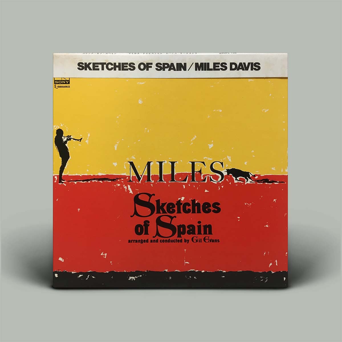 Album cover of 'Sketches of Spain' by Miles Davis with a yellow and red design.