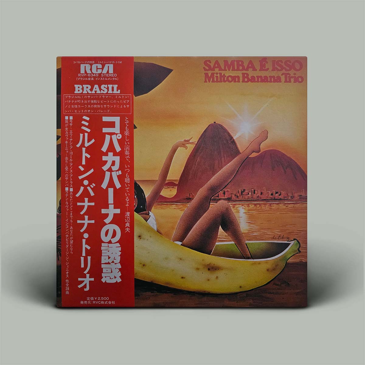 Album cover of Milton Banana Trio's 'Samba E Isso' with a person in a banana boat and mountain in the background.