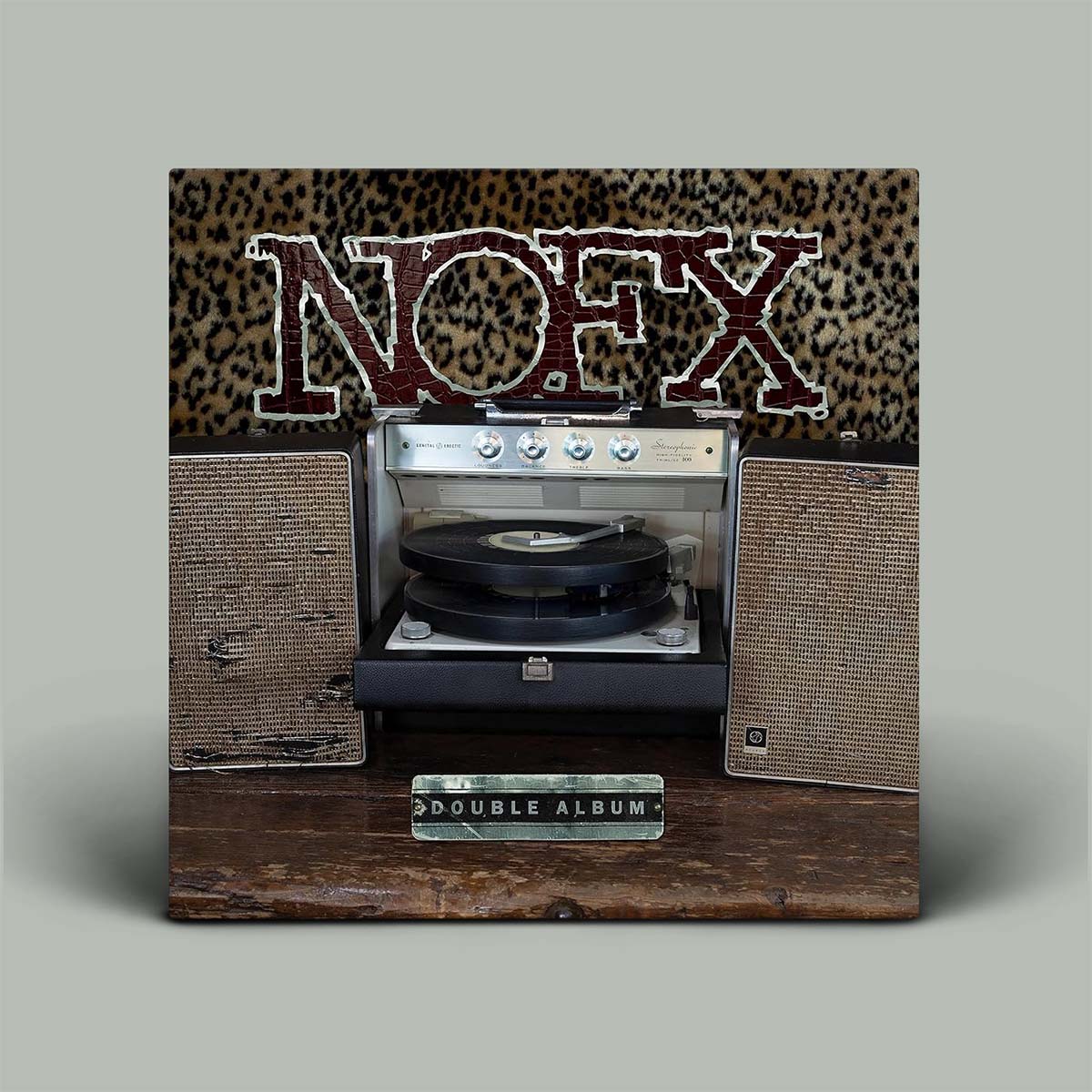 Album cover with a record player design and 'NOFX' branding on a gray background