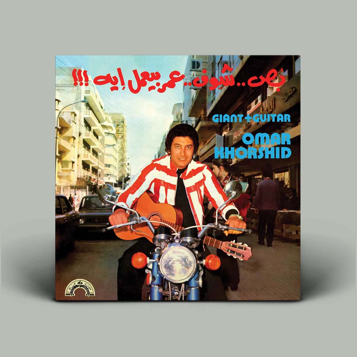 Album cover featuring a person on a motorcycle with text and branding