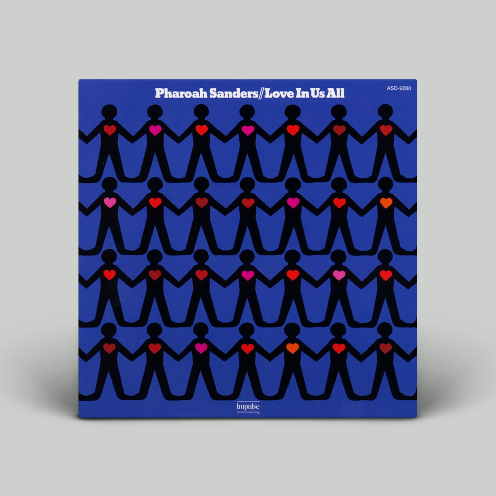 Album cover with black figures holding hearts on a blue background