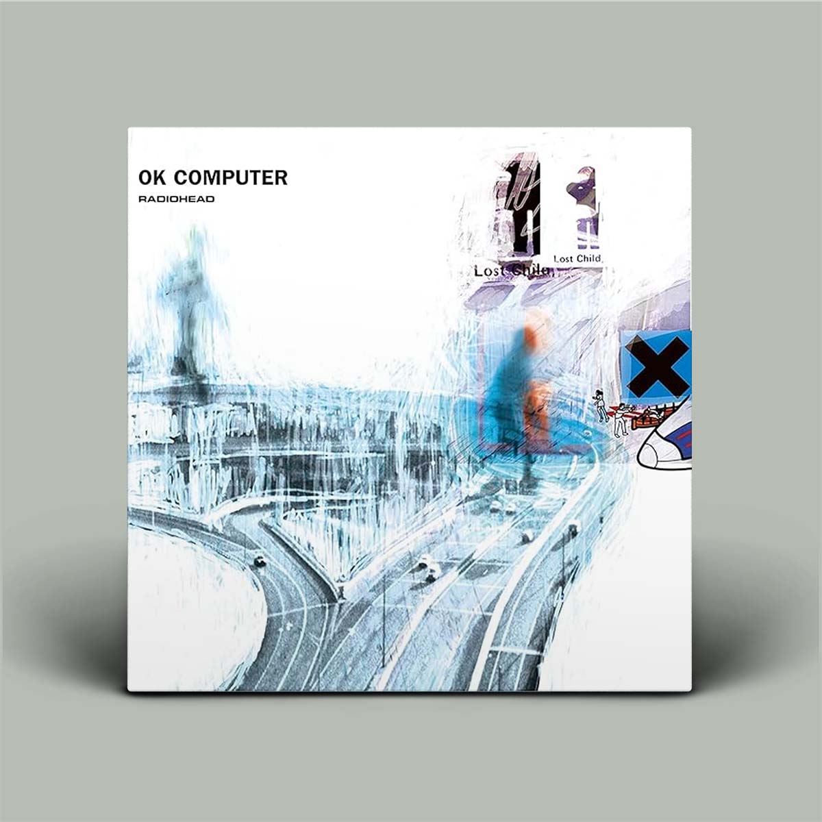 Album cover for 'OK Computer' by Radiohead on a gray background