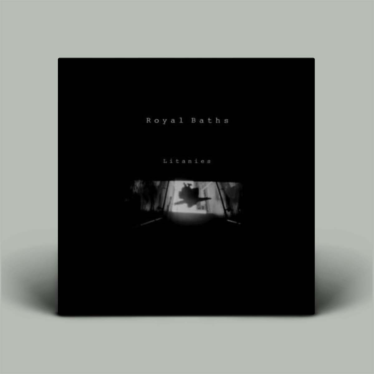 Black album cover with 'Royal Baths' and 'Litanies' text on a gray background