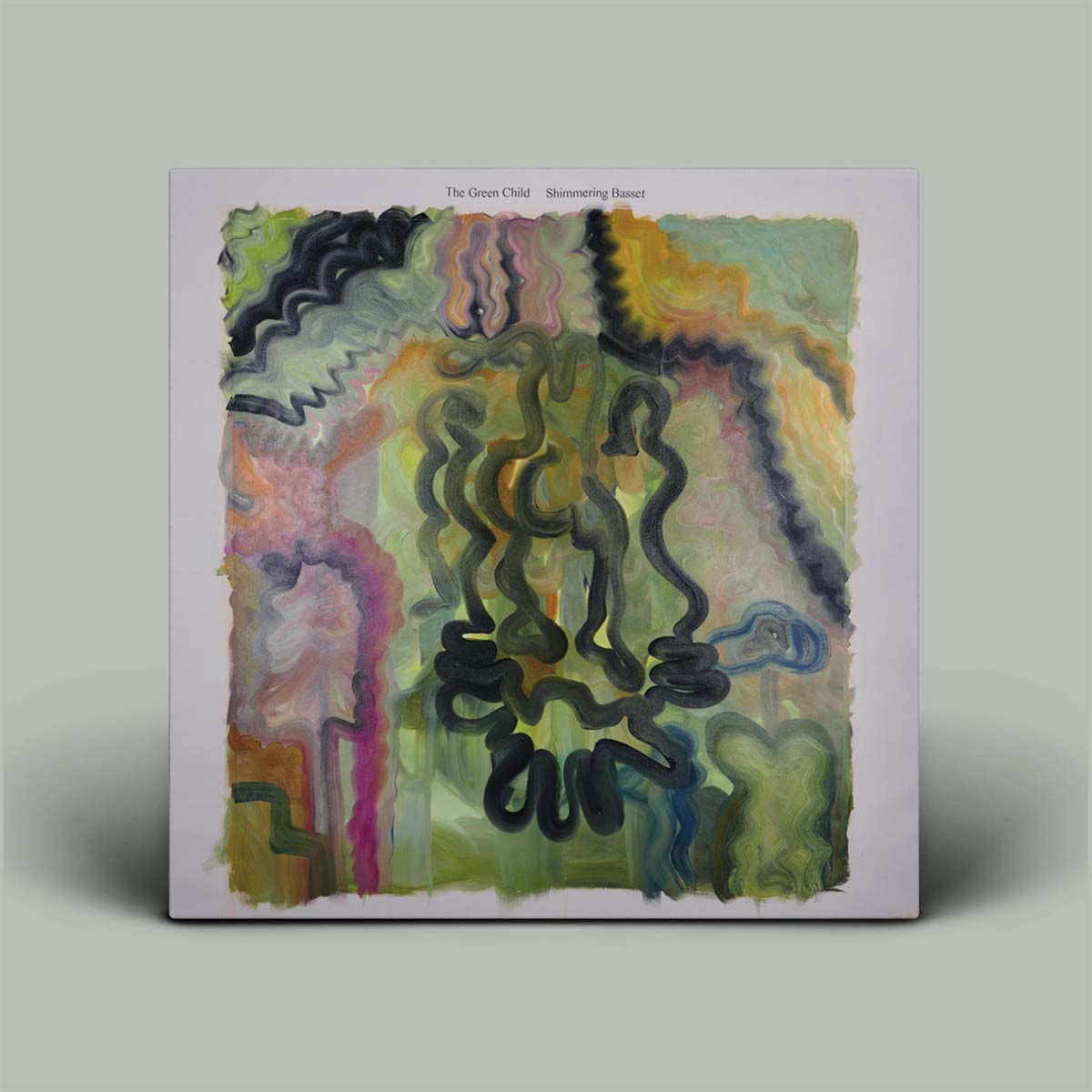 Album cover with abstract design on a gray background