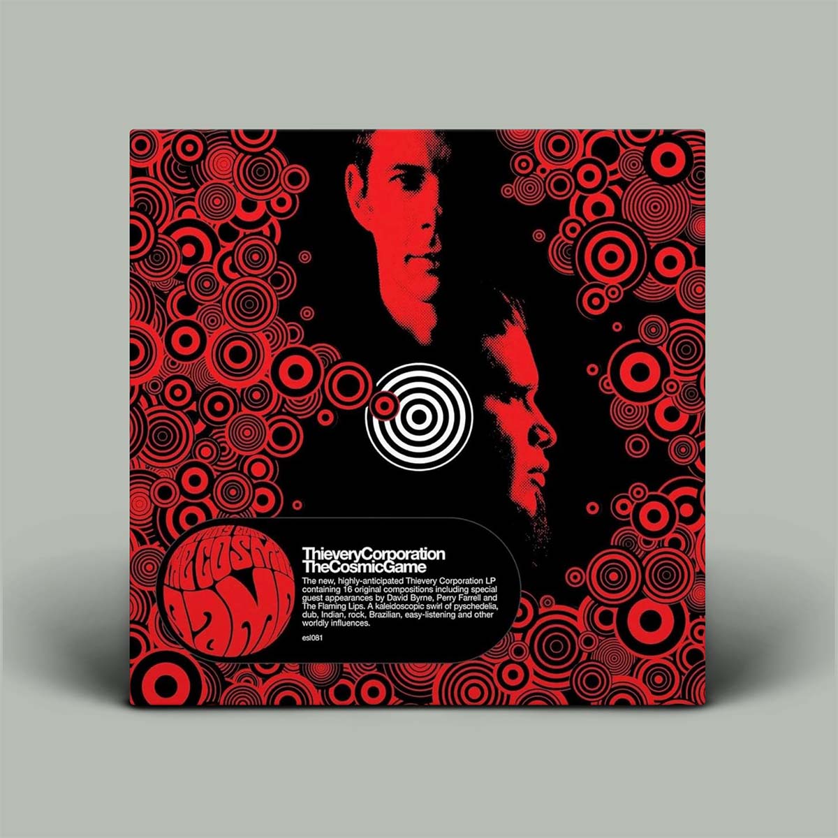 Vinyl record cover with red and black circular patterns and a face silhouette on a gray background
