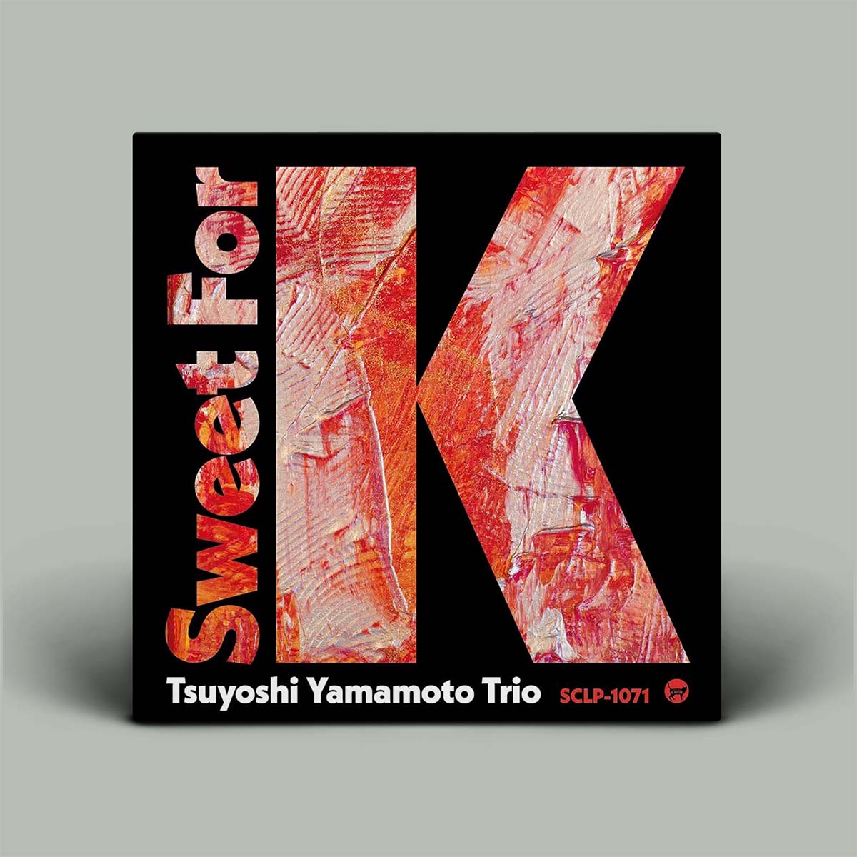 Album cover for 'Sweet For K' by Tsuyoshi Yamamoto Trio with red k on black background