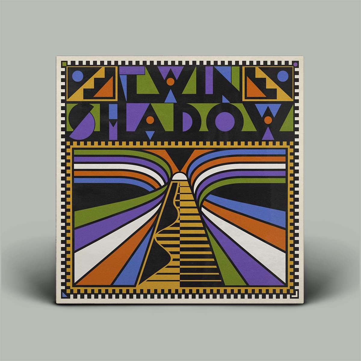 Album cover with geometric design and text on a gray background