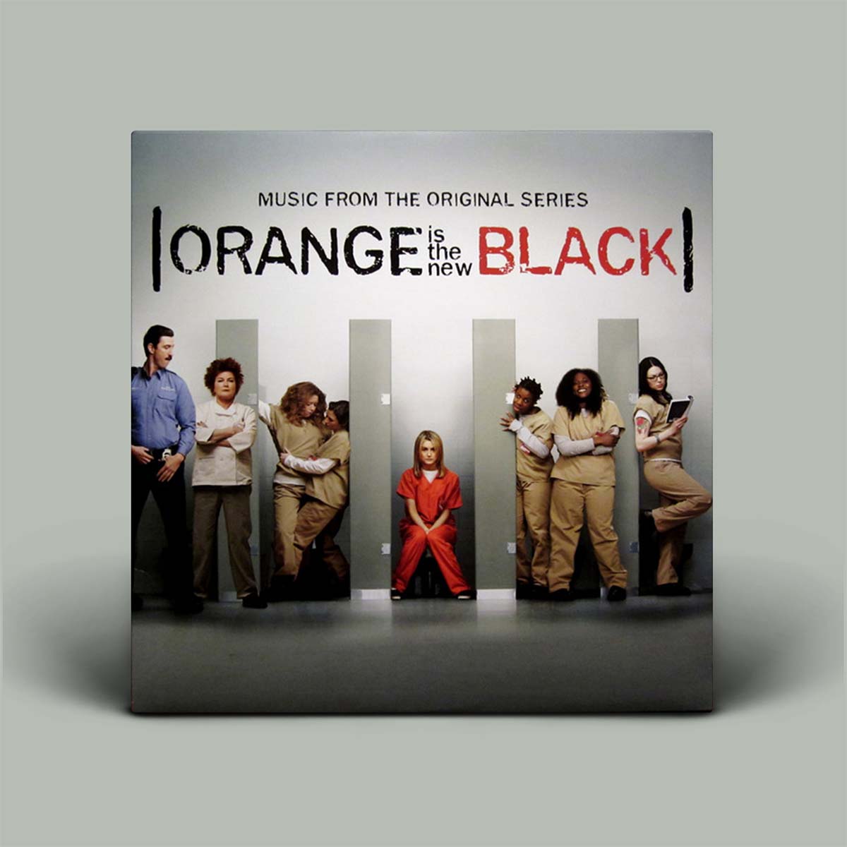 Album cover for 'Orange is the New Black' with characters from the series.