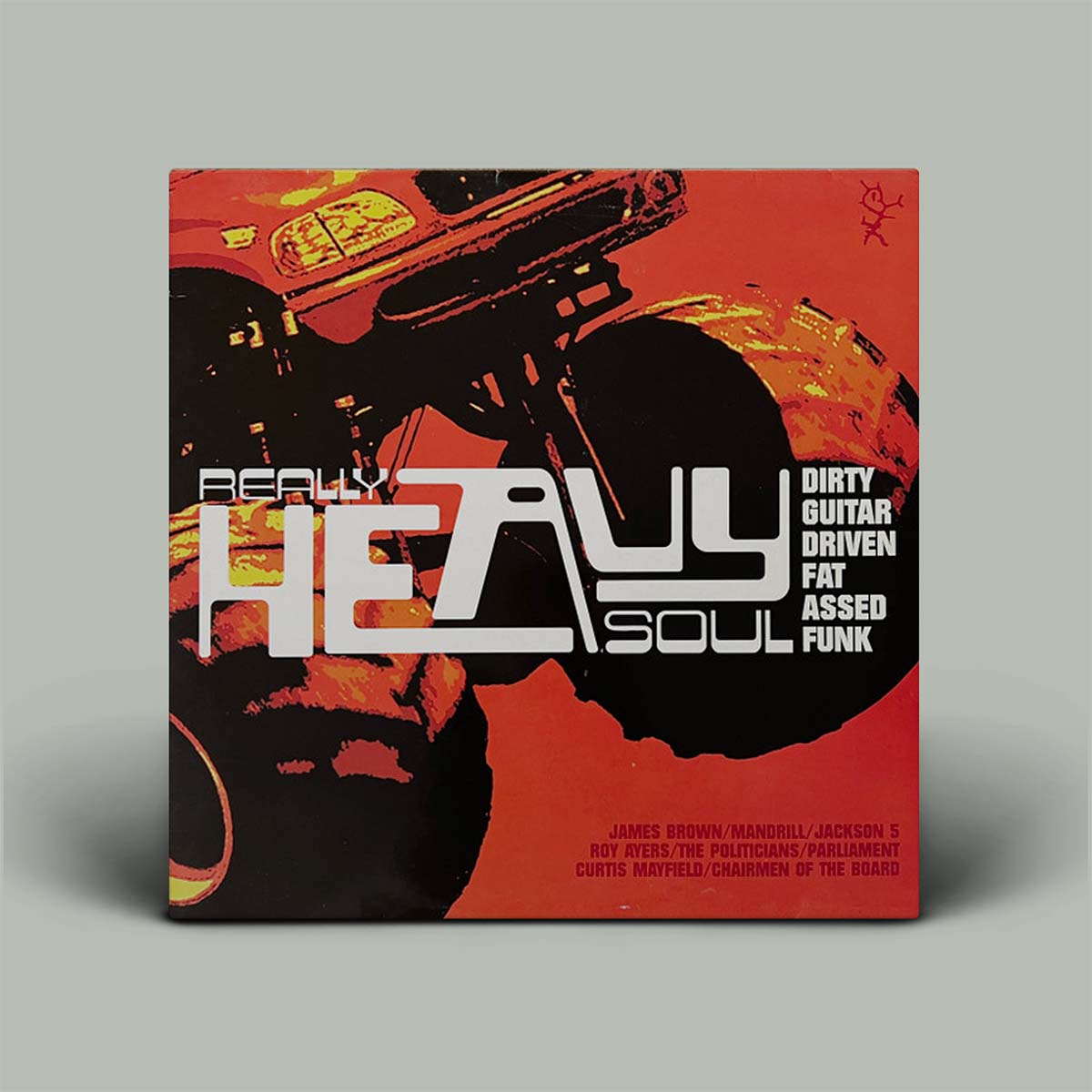 Album cover with white writing in the middle and red image of truck