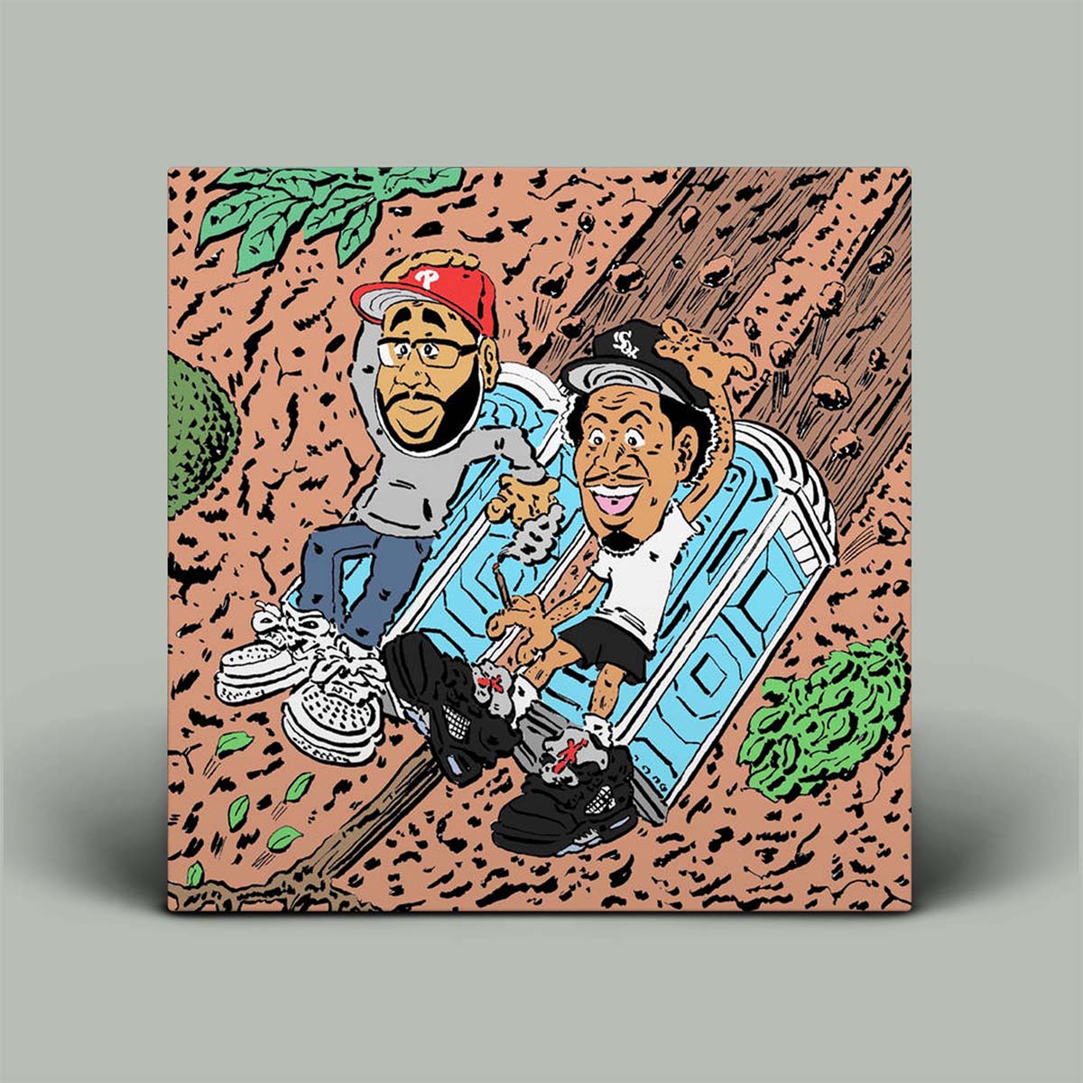 Album cover with graphic cartoon image of two guys sliding down a muddy hill on portaloos.