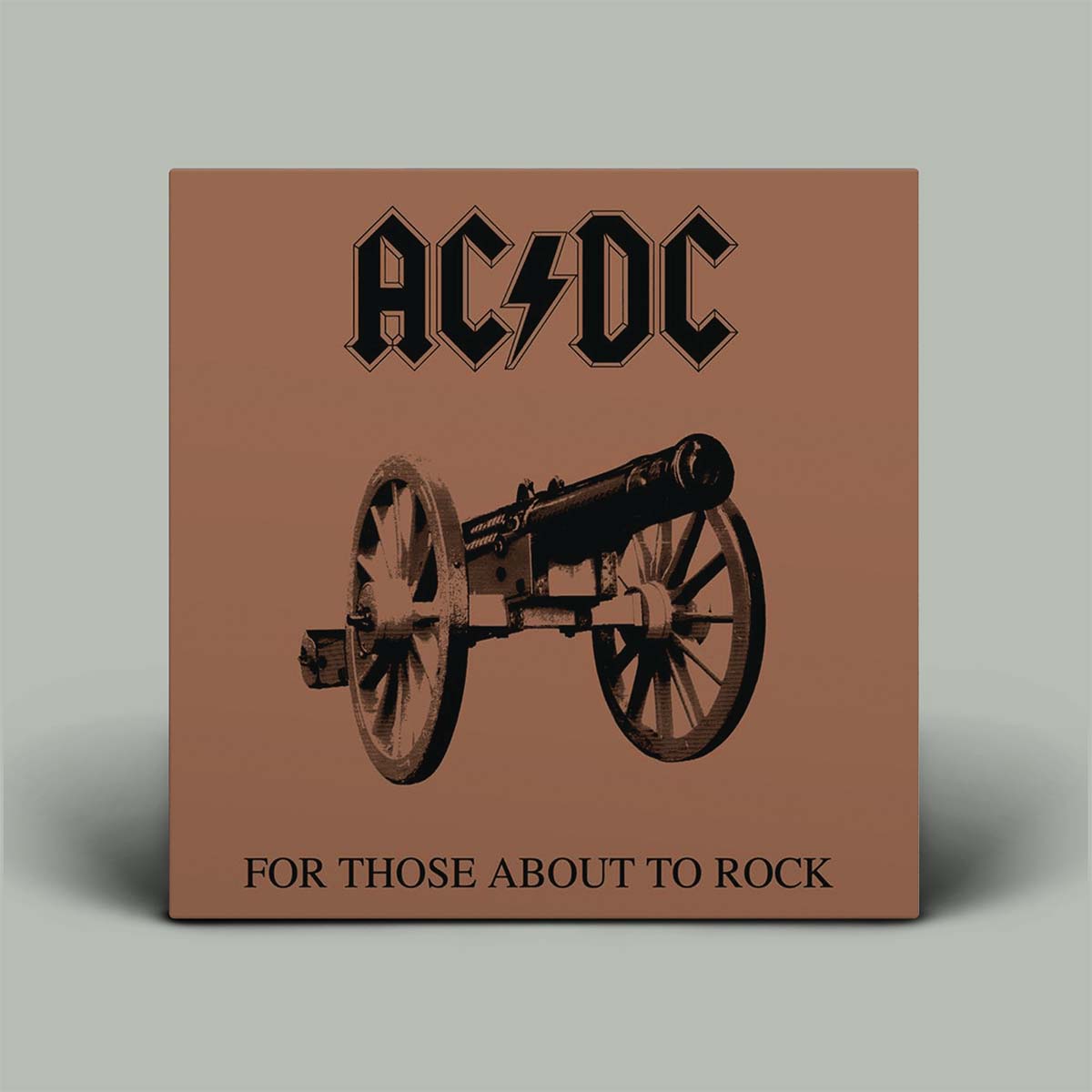 Album cover of AC/DC's 'For Those About to Rock' with a cannon illustration on a brown background.
