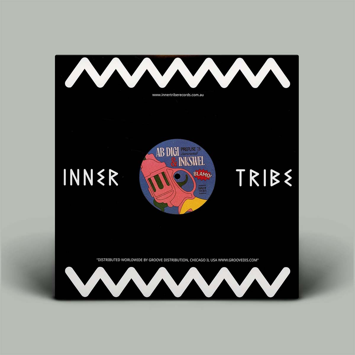 A square black album cover standing upright on a light gray background. The cover has white zigzag border graphics at the top and bottom, the words "INNER TRIBE" in white on the sides, and a colorful circular label in the center featuring a pink and yellow illustration with text including "AB DIGITAL DISTRIBUTION" and "Kings of NY".