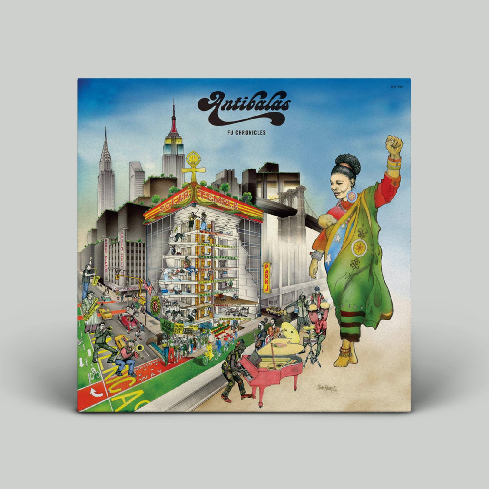 Album cover with a colorful illustration of a cityscape and a person in a green outfit, featuring the brand 'Nutibara'.
