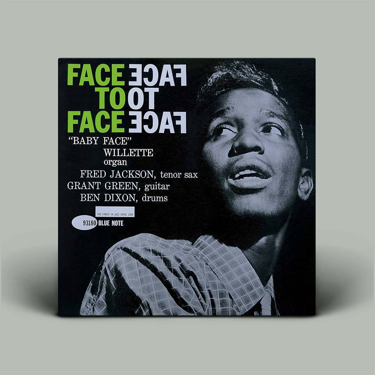 Album cover with a black and white portrait of a person and text on a gray background