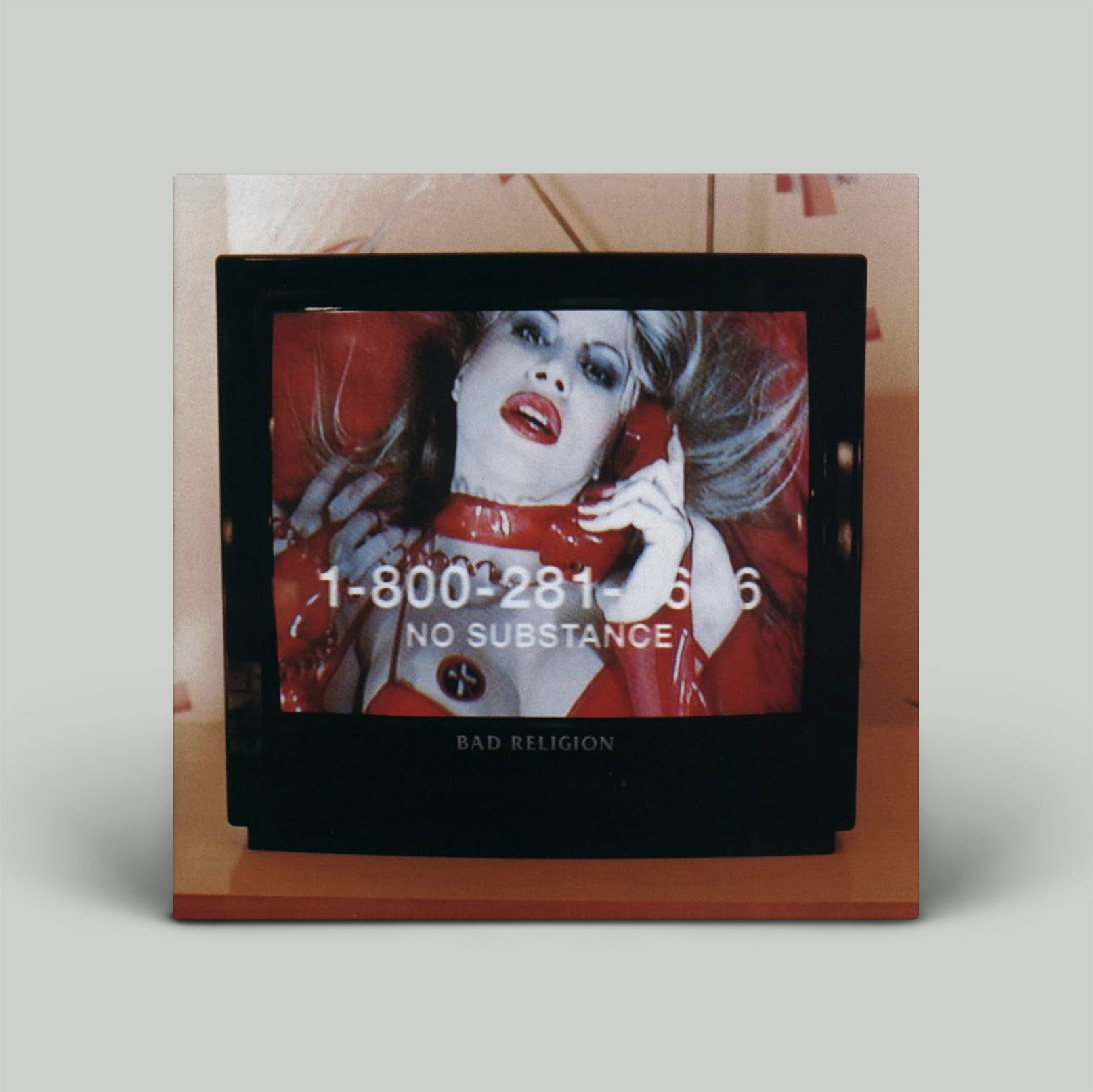 Album cover with a person holding a phone and text on a red background