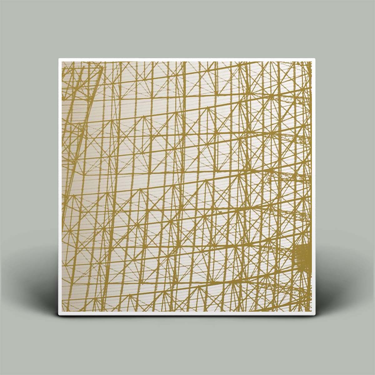 A square framed art print featuring an abstract geometric pattern of intersecting diagonal lines in a muted gold color on a warm off-white background, displayed against a solid gray background.