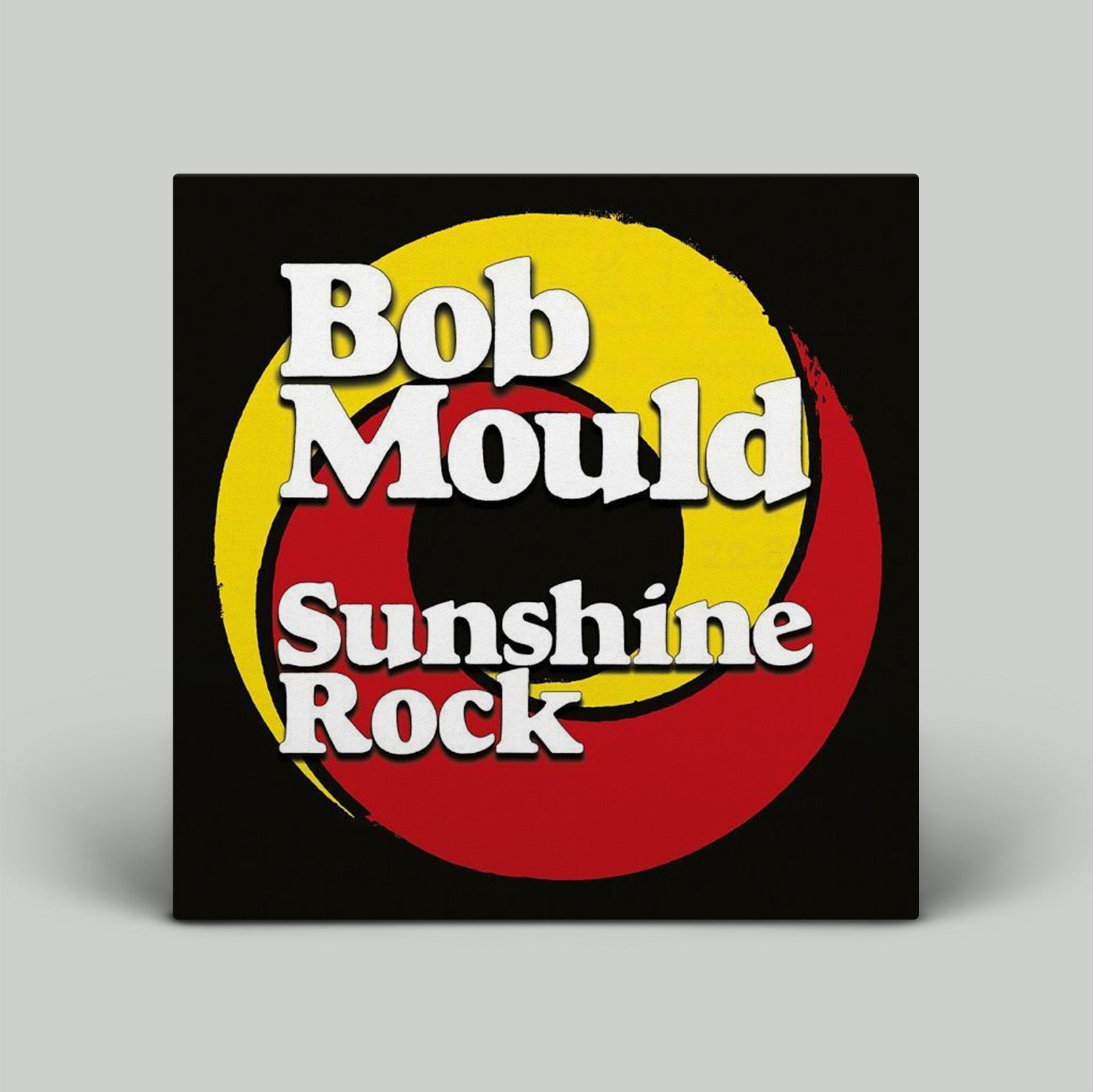 Album cover for 'Sunshine Rock' by Bob Mould with a yellow and red circle on a black background.