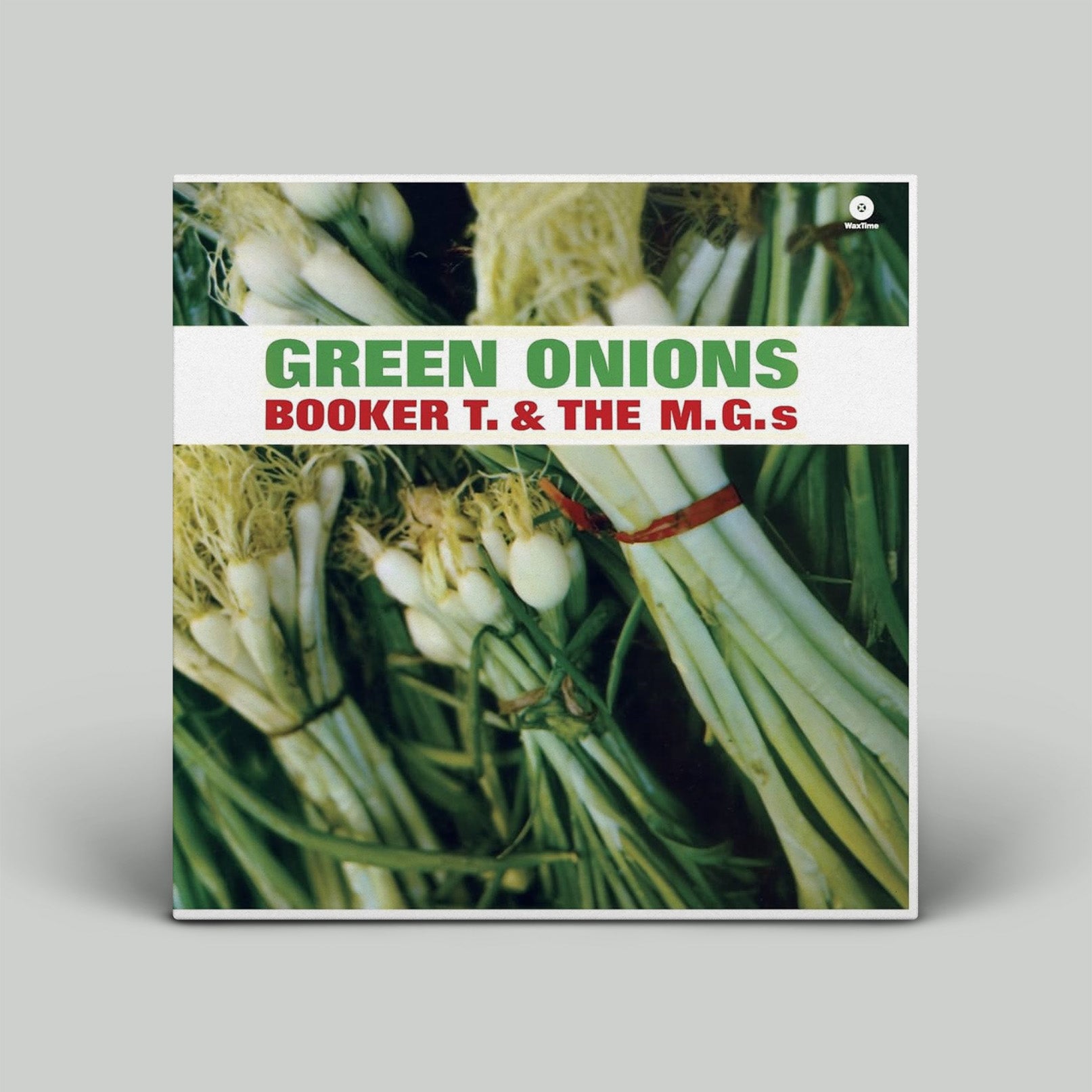 Album cover with green onions and text 'Green Onions' by Booker T. & The M.G.s