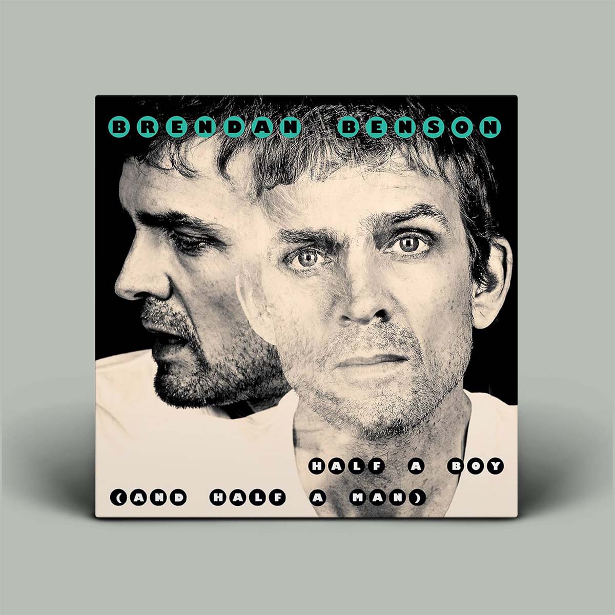 Album cover with portrait of the same face twice in black and white.