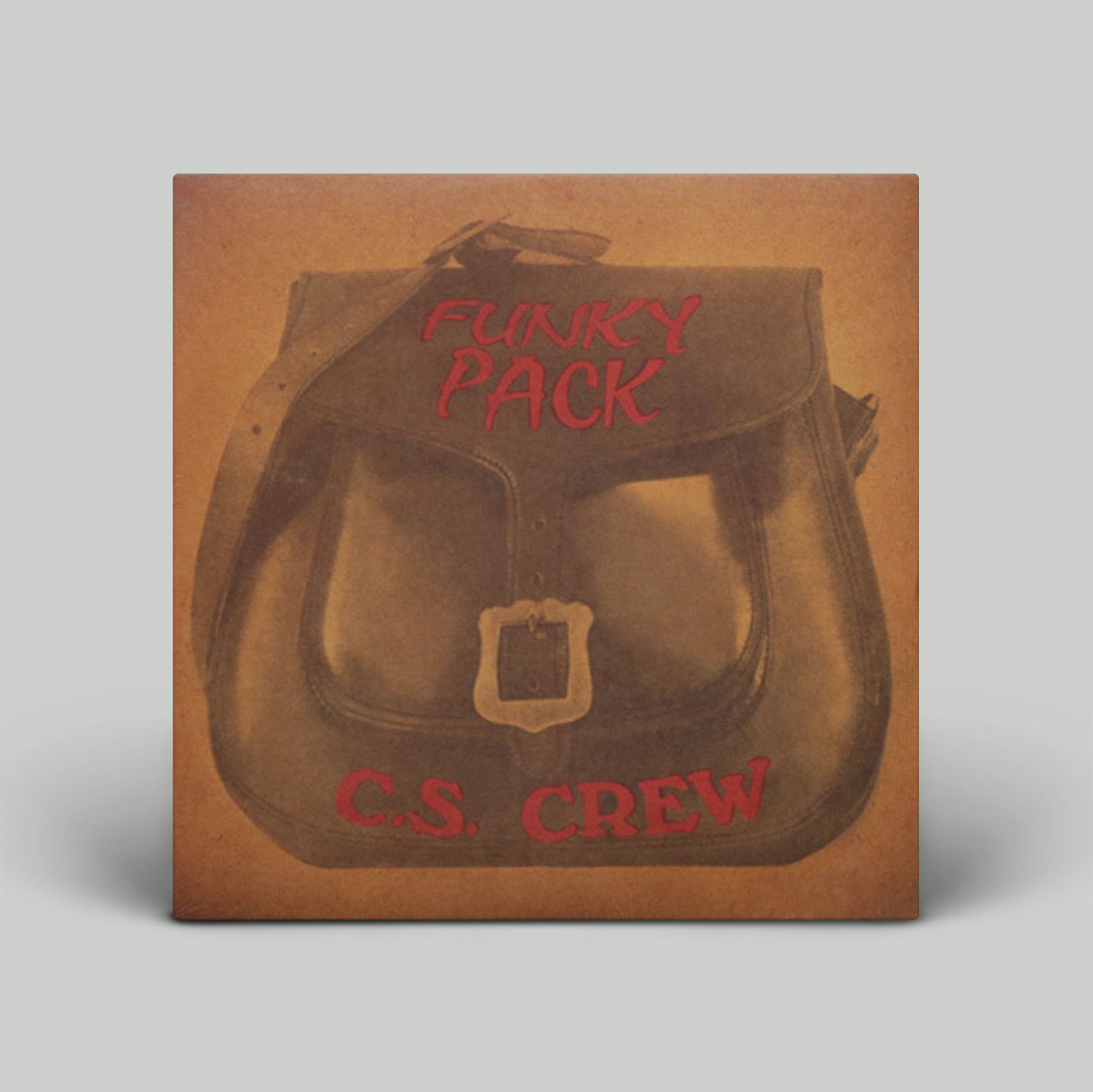 Brown leather pack with 'Funky Pack C.S. Crew' text on a gray background