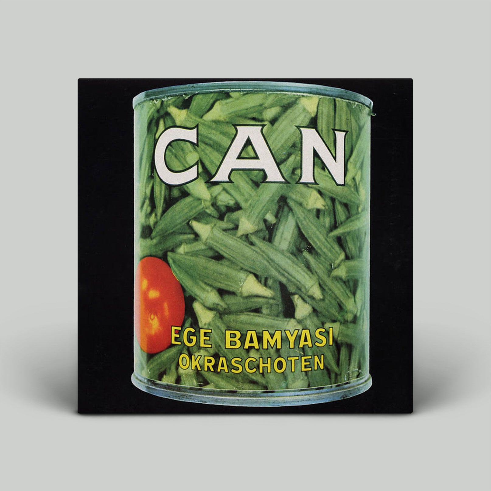 Can of okra with text on a black background
