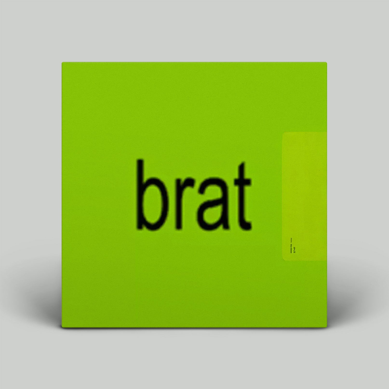 Green square with the word 'brat' in black text on a gray background